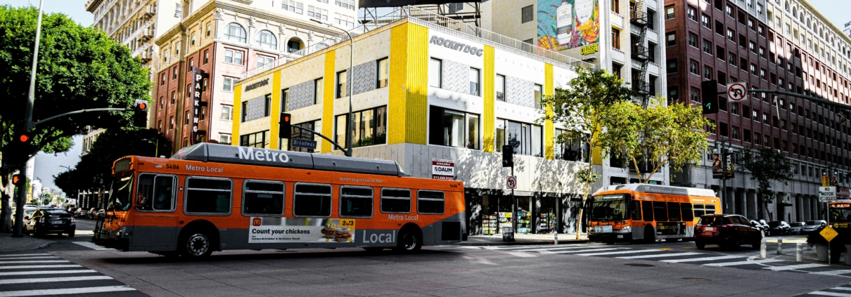 cleaning public transportation facilities with a pressure washer