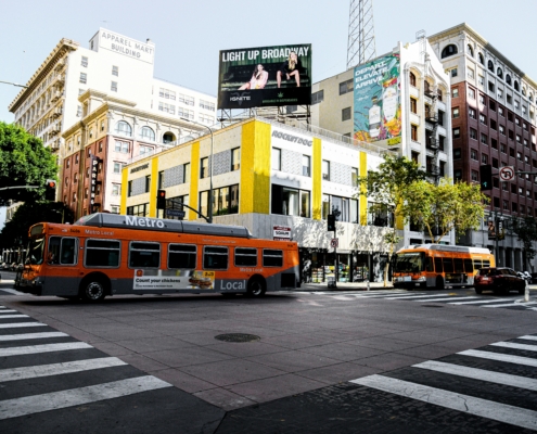 cleaning public transportation facilities with a pressure washer